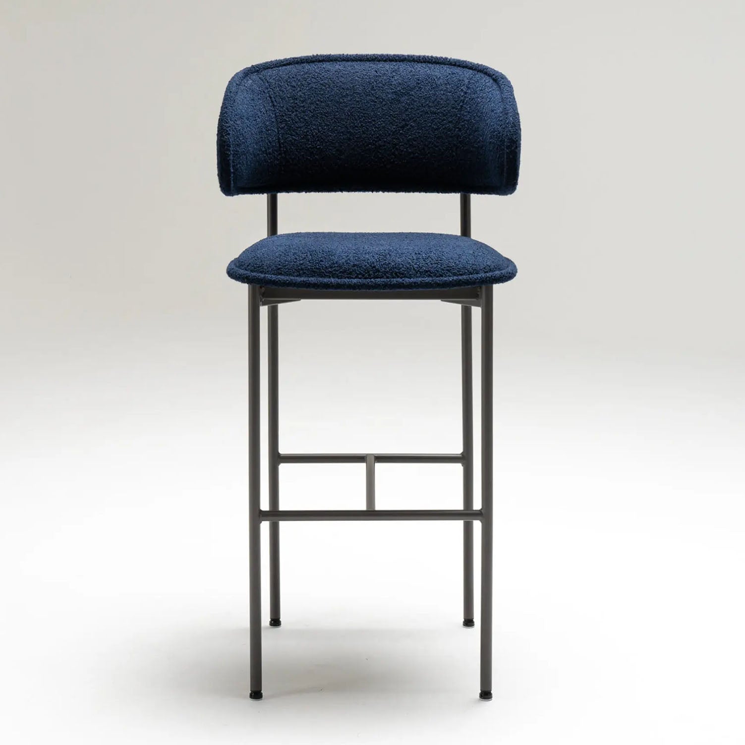 Blue CHLOE bar stool with a gray metal frame facing front on a white background