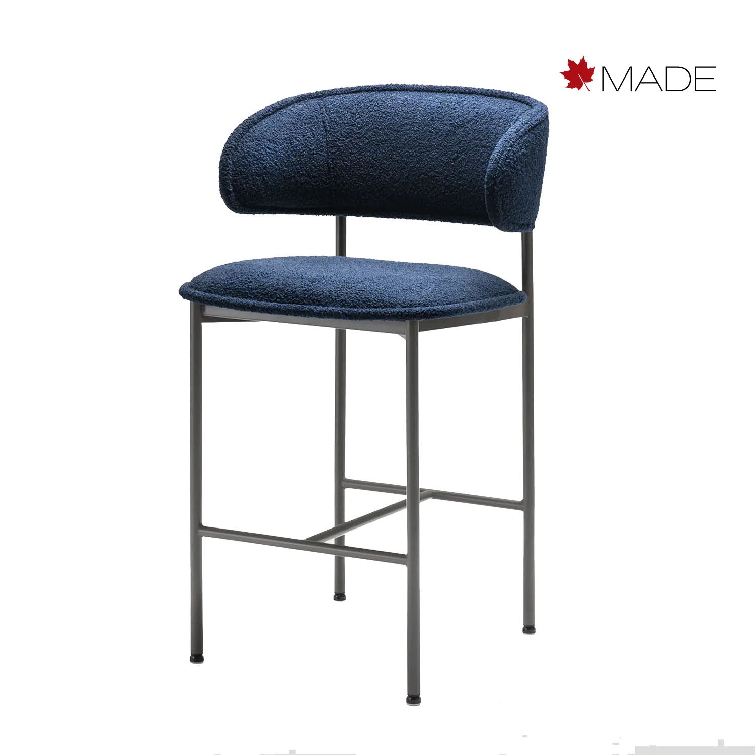 Blue CHLOE bar stool with a textured seat and backrest on a white background, featuring the 'MADE' brand logo.