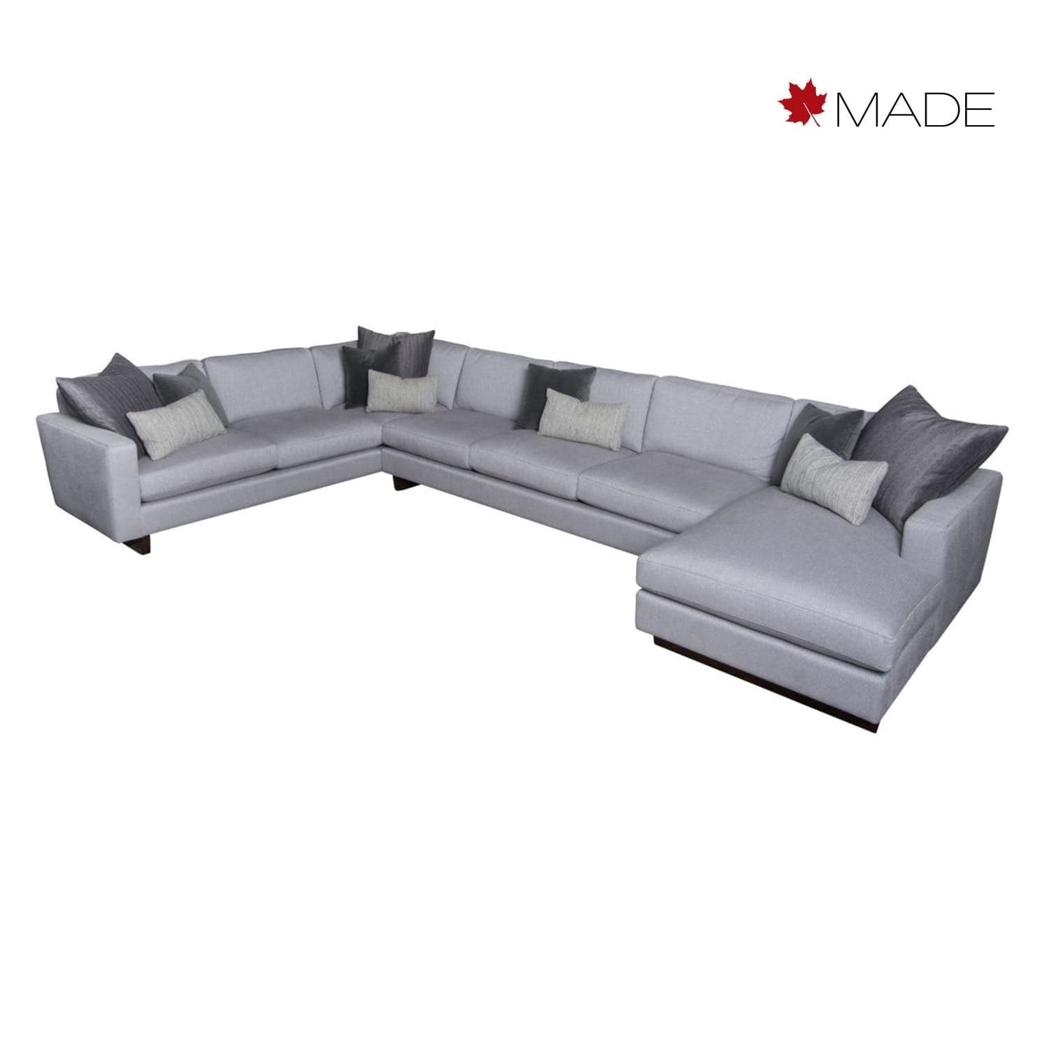 Leonardo sectional sofa with cushions on a white background, featuring the 'MADE' brand.