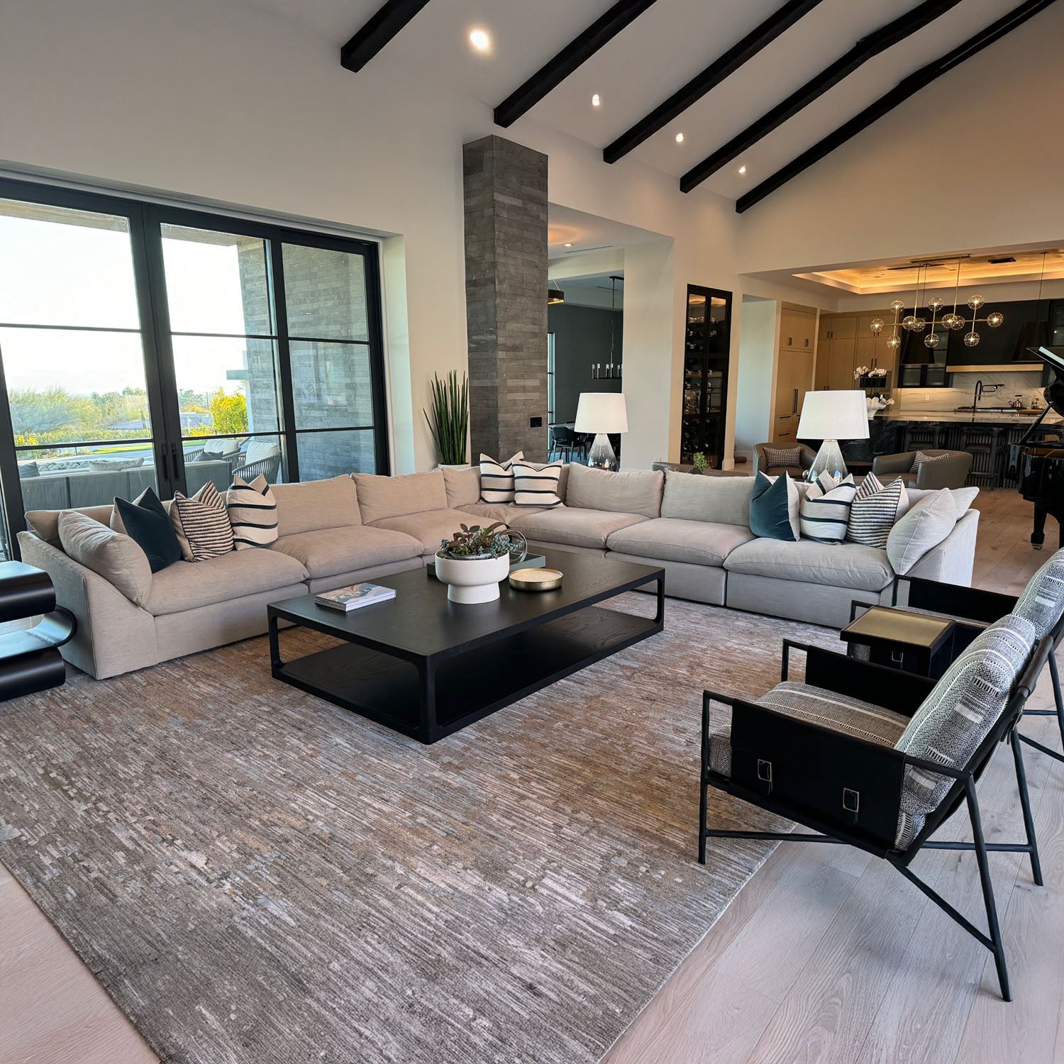 Modern living room with a Skyler
sectional sofa, coffee table, and decorative elements.
