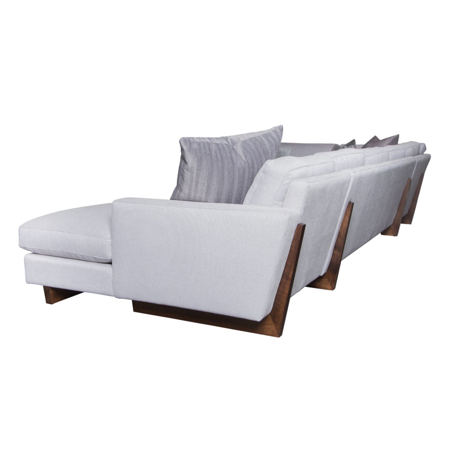 Modern Leonardo sofa with wooden leg detail on back of sofa on a white background