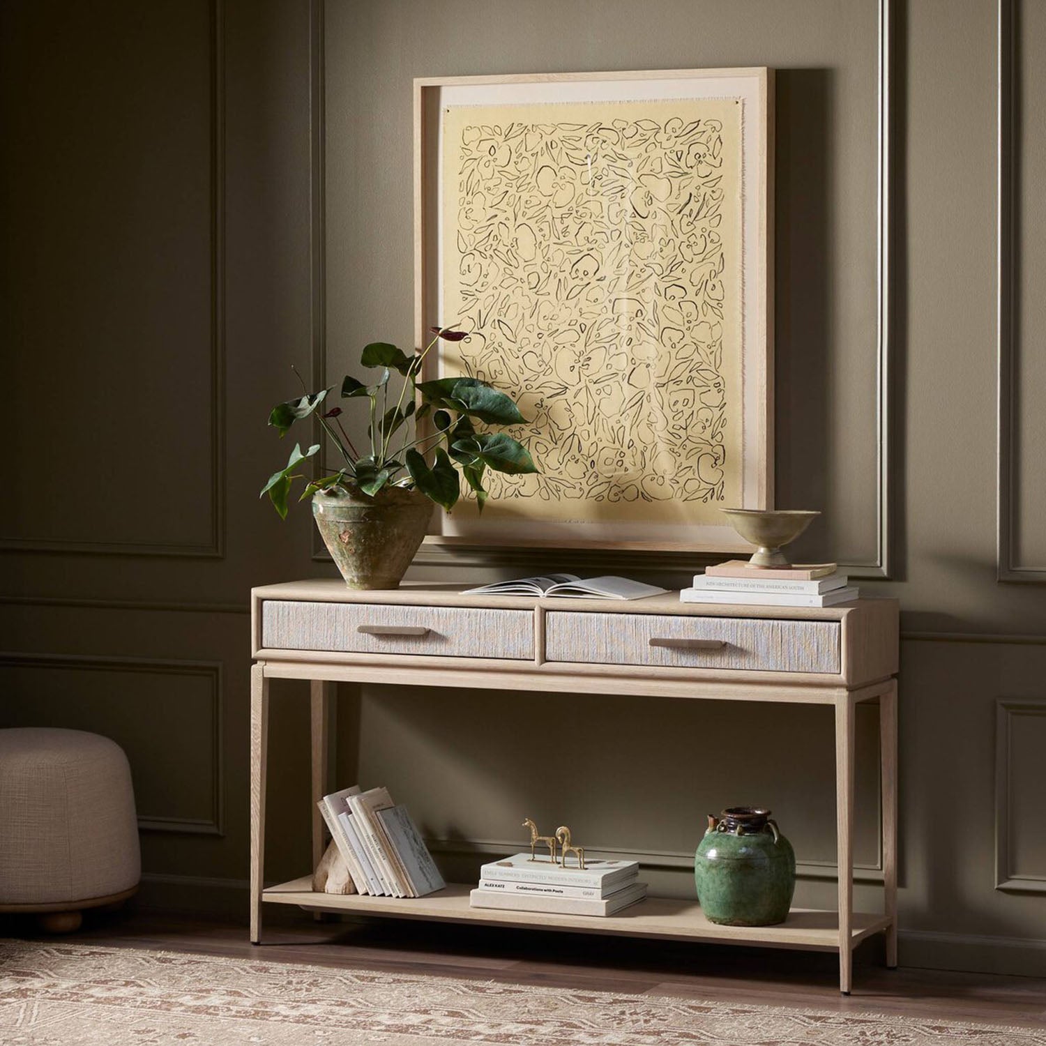 Rosenell natural oak console in a living room with abstract art