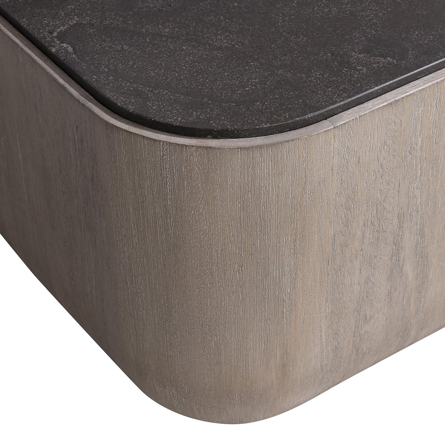 Croft coffee table from Bernhardt with bluestone top and mahogany base on a white background detail view
