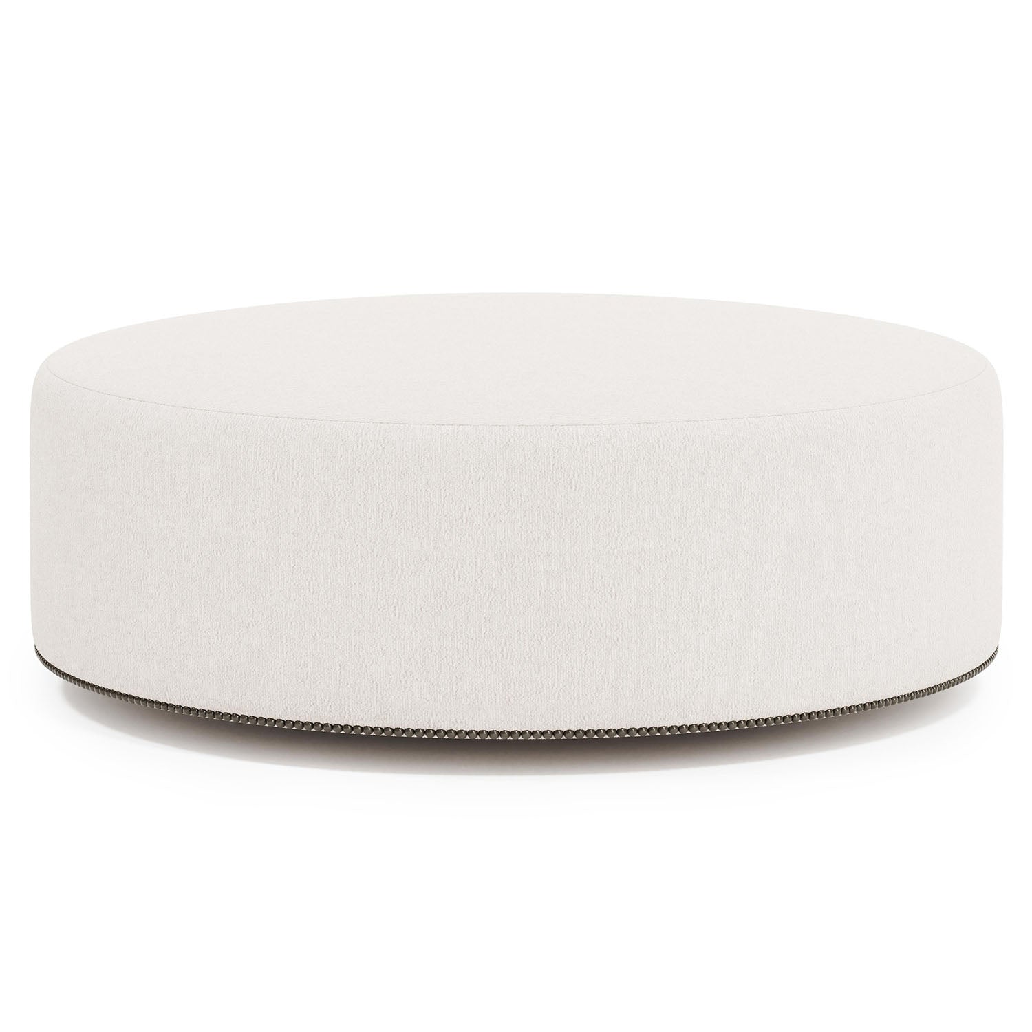 Lolo Round white ottoman with nailheads on a white background
