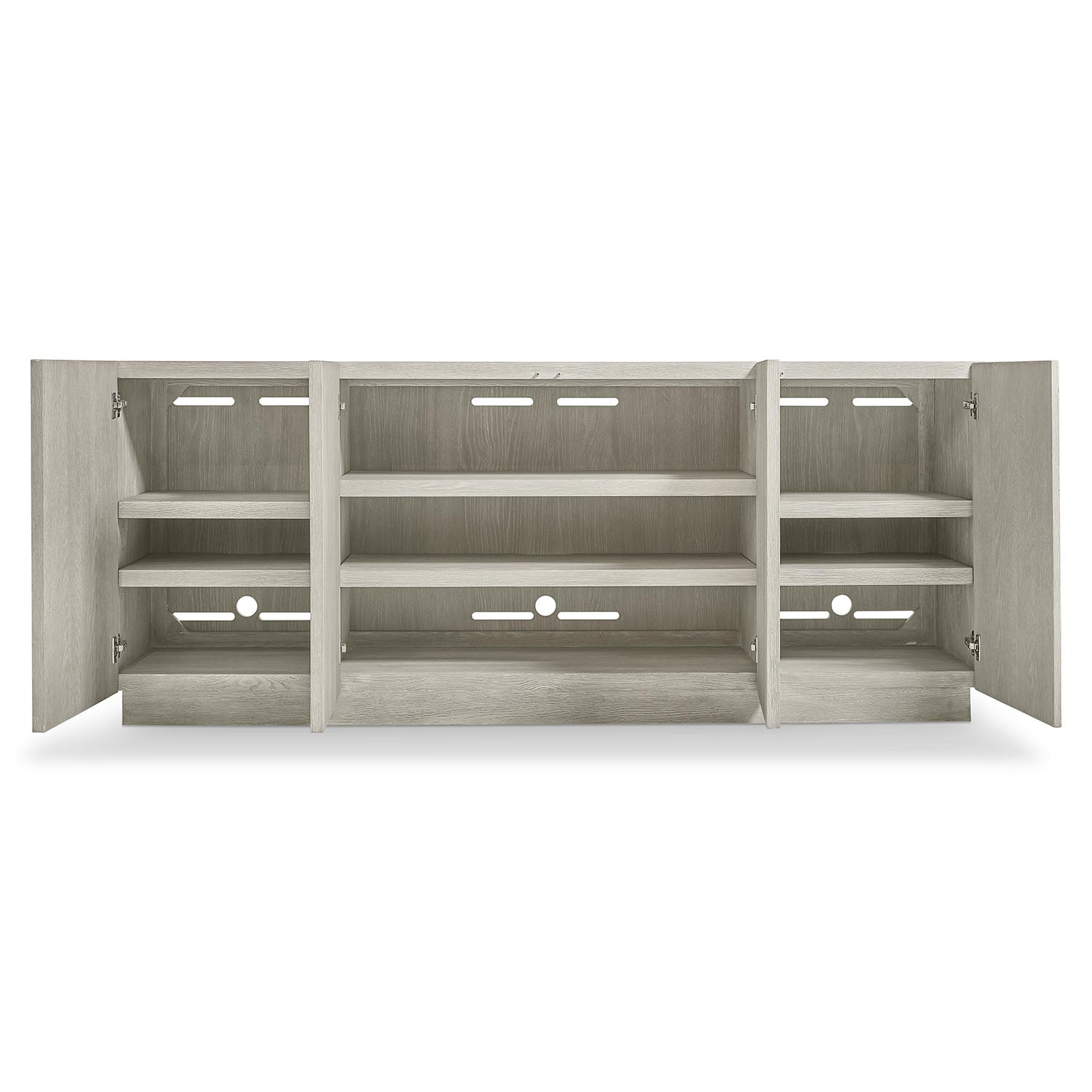 Tempo Credenza from Bernhardt with open doors on a white background