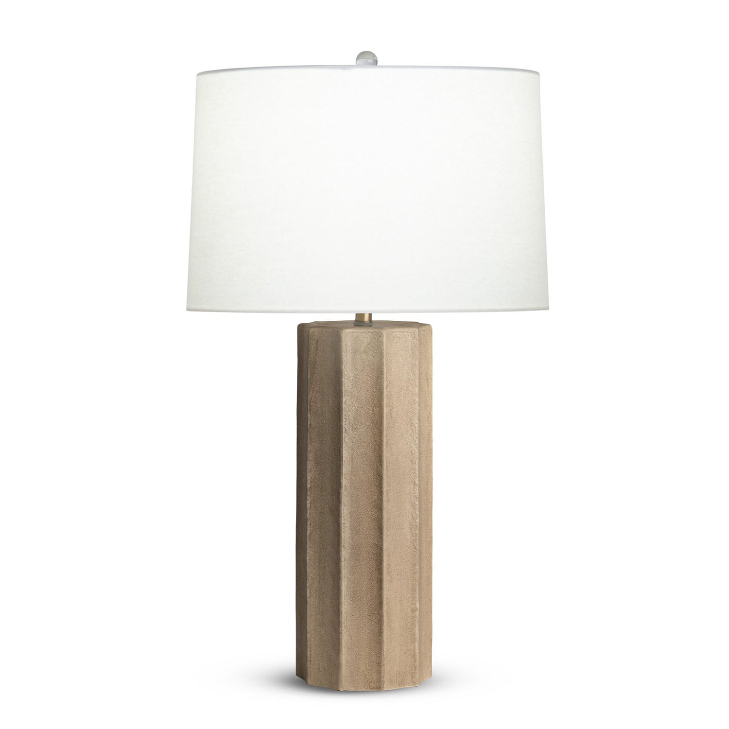 Capri table lamp with glass base in sand finish and off white linen shade on a white background